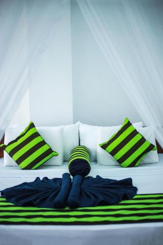 Кровать или кровати в номере City Heaven Ella