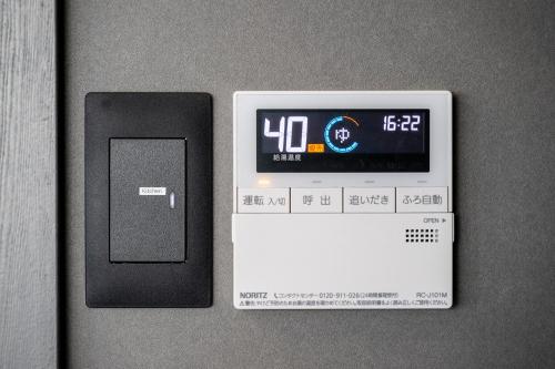 an electronic device with a clock on a table at nabe cape in Tagawa