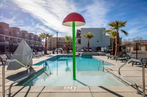 a pool with a green and red pole in the water at Family Retreat at the Vue #15 townhouse in St. George