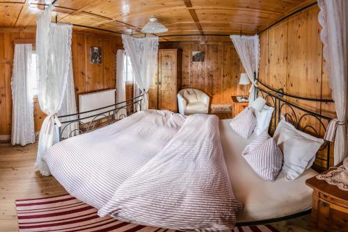 מיטה או מיטות בחדר ב-Haus Guglprasta
