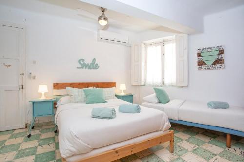 Posteľ alebo postele v izbe v ubytovaní Big Flat in City Center with Patio