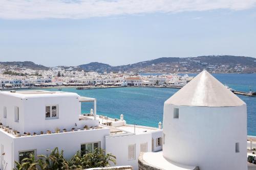 a view of a town from the top of a white building at Porto Mykonos in Mýkonos City