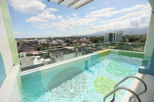 a swimming pool on top of a building at M.Y. Hotel in Dumaguete