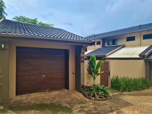 a garage door in front of a house at Riverglades 4 in Ramsgate