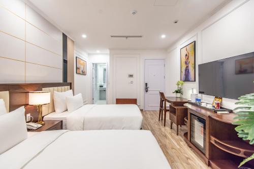 Μια τηλεόραση ή/και κέντρο ψυχαγωγίας στο Reyna Luxury Hotel