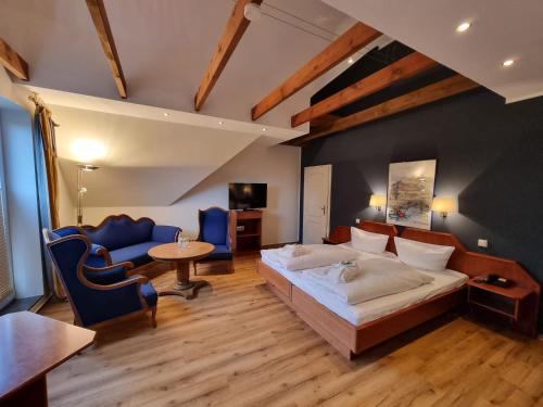 Postel nebo postele na pokoji v ubytování Hotel Osterkrug