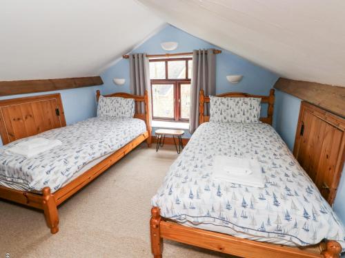 Postel nebo postele na pokoji v ubytování The Barn at Harrolds Farm
