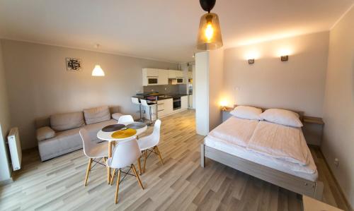 En eller flere senge i et værelse på Wyspa Uznam - Platan