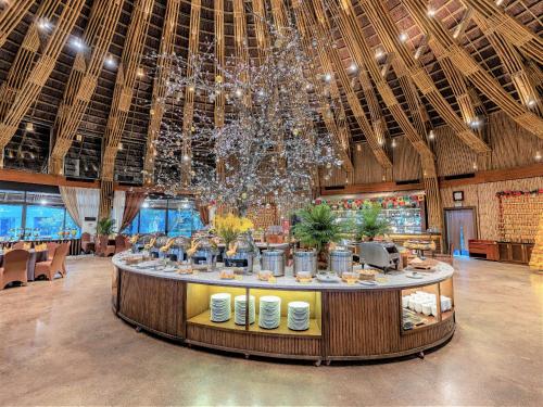 a large room with a large chandelier in a building at Serena Kim Boi Resort - Hoa Binh in Hòa Bình