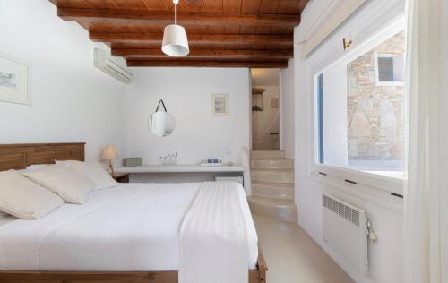 Postel nebo postele na pokoji v ubytování Villa Lisante