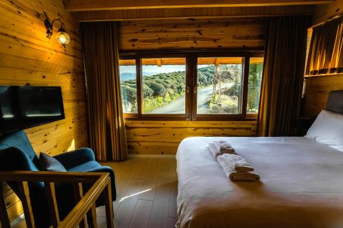 Postel nebo postele na pokoji v ubytování Sarı Köşk Hotel