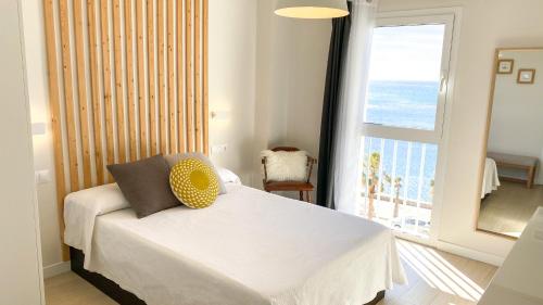 Postel nebo postele na pokoji v ubytování Beach & Calm Apartment
