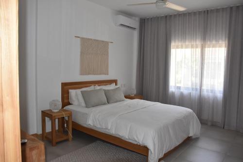 Postel nebo postele na pokoji v ubytování Cap Sud Apartment