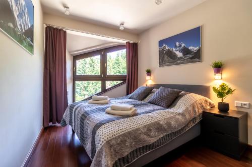 Posteľ alebo postele v izbe v ubytovaní Mountain Apartments Butorowy Sauna Residence