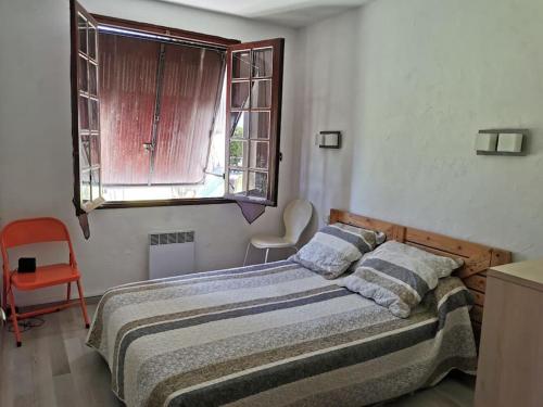 Ένα ή περισσότερα κρεβάτια σε δωμάτιο στο villa plain pied 4 chambres à 100m de la plage