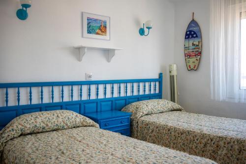 Posteľ alebo postele v izbe v ubytovaní Primera Línea de Playa