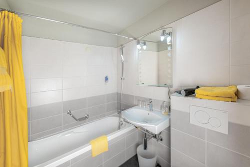 Salle de bains dans l'établissement Hotel Mountime