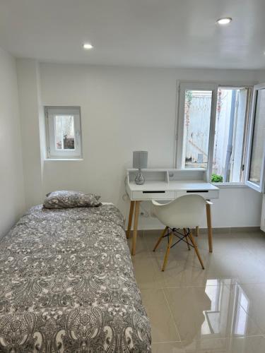 Posteľ alebo postele v izbe v ubytovaní Chambre 14m2
