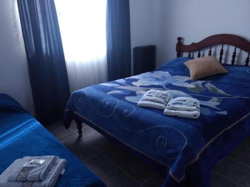 Una cama o camas en una habitación de Nuestra Patagonia