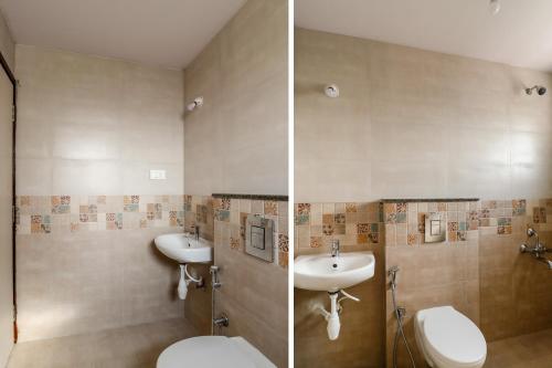 a bathroom with two sinks and a toilet at Capital O N R Residency in Bengaluru