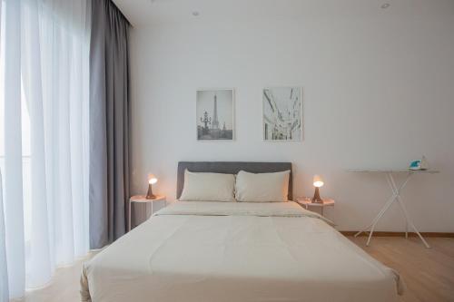 Katil atau katil-katil dalam bilik di Good Seaview Condo, near Queensbay