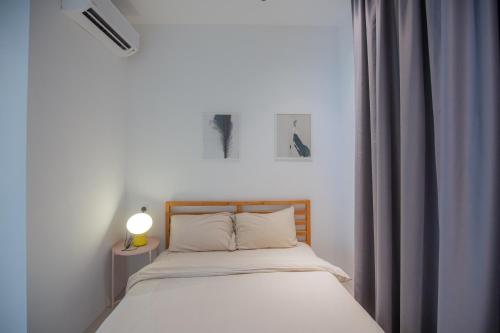 Katil atau katil-katil dalam bilik di Good Seaview Condo, near Queensbay