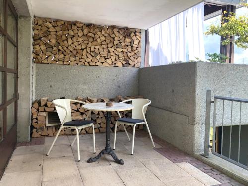 a table and two chairs sitting on a patio at Zwischen Hafen und Strandbad in Konstanz