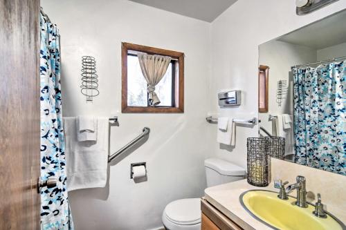 a bathroom with a sink and a toilet at Loveland Vacation Rental - 1 Mile to Lake! in Loveland