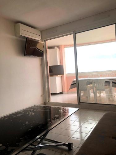 Photo de la galerie de l'établissement SAVANNA BEACH I Joli T3 vue mer piscine Cap d'Agde, au Cap d'Agde