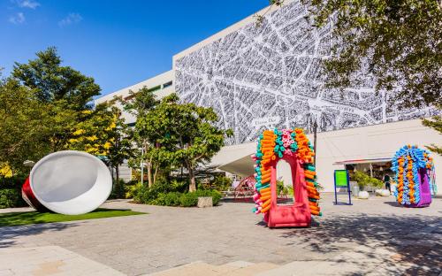 a playground in front of a building at Up Midtown in Miami