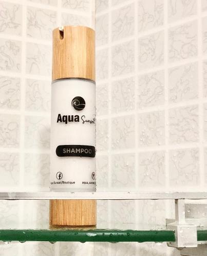 a bottle of shamboro on a wall at Aqua Sunset in Gulhi