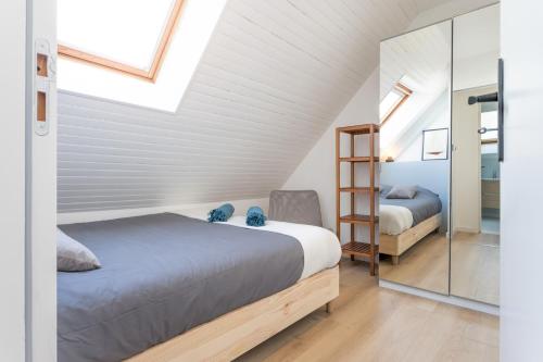 Posteľ alebo postele v izbe v ubytovaní Appartement neuf & tout confort - Proche Centre ville par Groom