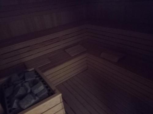 a minecraft room with a tub with a pile of rocks at Hotel Delphin-Nouadhibou in Nouadhibou