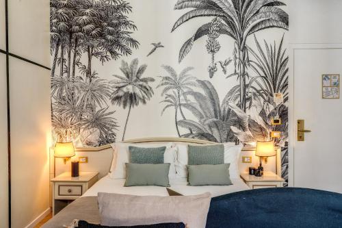 a bedroom with a bed with a tropical wallpaper at Baboon Room in Rome