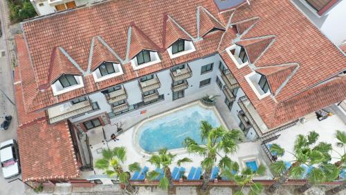 an aerial view of a hotel with a swimming pool at Orange Garden Apart Hotel in Kemer