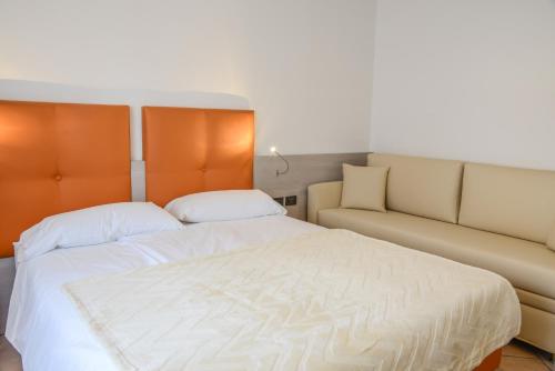 Ένα ή περισσότερα κρεβάτια σε δωμάτιο στο Residence Franca B&B
