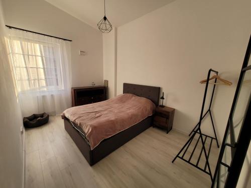 Postel nebo postele na pokoji v ubytování Apartament w Starym Mlynie Loft Różanka