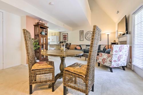 a dining room with a table and chairs at Lovely Norwich Villa, On Golf Course with Amenities! in Norwich