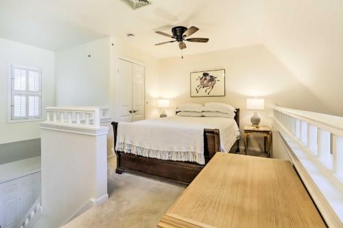 a bedroom with a bed and a ceiling fan at Cozy Norwich Villa on Golf Course Near Spa! in Norwich