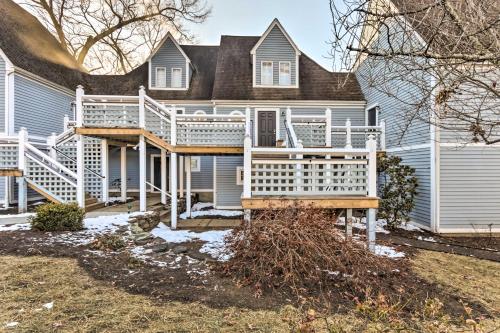 a house with a porch with a white deck at Lovely Norwich Villa, On Golf Course with Amenities! in Norwich