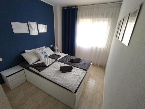 Postel nebo postele na pokoji v ubytování MILA Słoneczny Apartament w Torrevieja Centrum