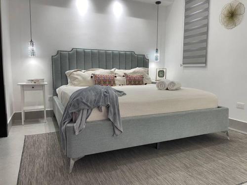 Postel nebo postele na pokoji v ubytování Paradise Room Rialto Residences