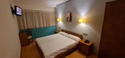Cama o camas de una habitación en Hotel Ciudad de Corella