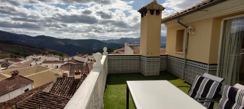 a balcony with a view of a city at Casa Carmen in Faraján