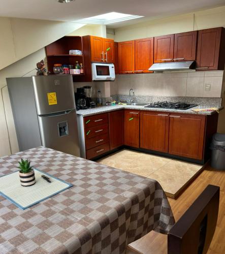Nhà bếp/bếp nhỏ tại Departamento de 2 habitaciones amoblado en urbanización privada