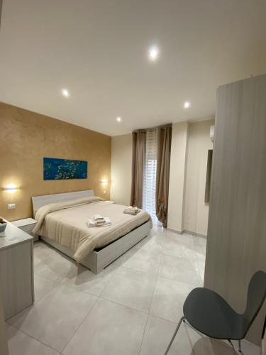 Posteľ alebo postele v izbe v ubytovaní B&B San Giuseppe, nel cuore di Ortigia