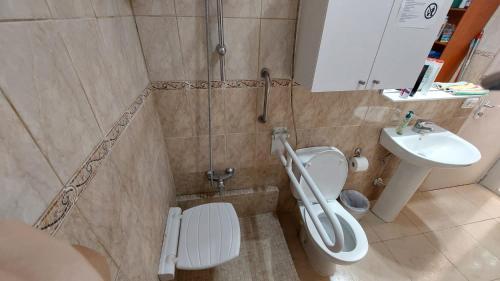 a bathroom with a shower and a toilet and a sink at SIMPLE Apartment Frontera Primavera POOL in South TENERIFE in Costa Del Silencio