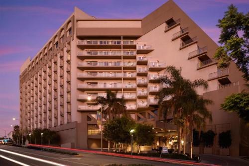 a large building with a street in front of it at Le Meridien Delfina Santa Monica in Los Angeles