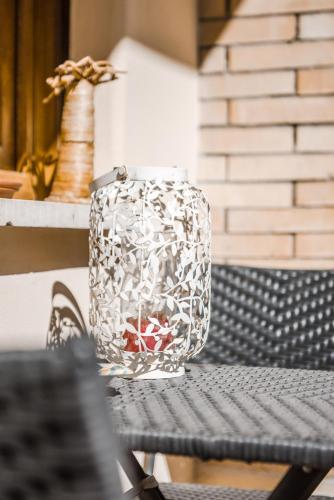 a glass container sitting on top of a table at Casa 3 Santi, your contemporary home in Rome in Rome