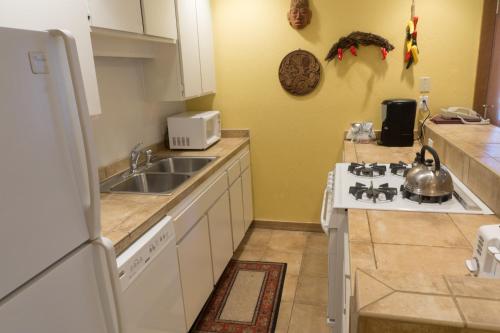 a kitchen with a sink and a stove at 4081 Ski Trails in Truckee